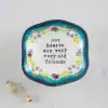 Colorful decorative plate with the quote 