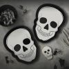 Skull-shaped Halloween party balloons and decorations for spooky celebrations and themed events.