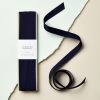 Recycled grosgrain ribbon for craft and gift wrapping from The Wraperie. Eco-friendly, high-quality ribbon in navy blue, perfect for sustainable packaging and creative projects.