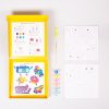 Colorful DIY craft kit with stickers, rollers, and coloring pages for kids to create personalized animated character designs and fun accessories at The Wraperie.