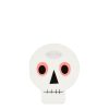 Colorful skull-shaped food wrapper with cute design, perfect for Halloween treats or themed snacks.