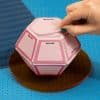 Colorful sticky note cube with sections labeled for notes such as 