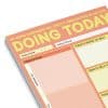 Colorful daily planner sheet for organizing tasks and self-care at The Wraperie, designed for productivity and motivation.