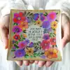 Bright floral greeting card with uplifting message 