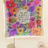 Colorful floral illustration with inspirational quote at The Wraperie.