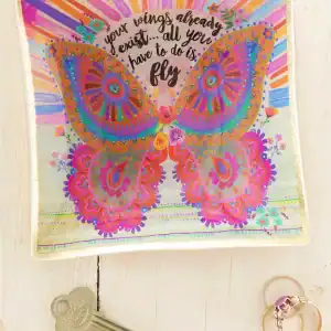 Colorful butterfly-themed art print with an inspiring quote about flying, surrounded by floral accents. Perfect for uplifting home decor and motivational spaces.
