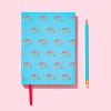 Vibrant floral patterned notebook with a matching blue pencil on a pink background, perfect for journaling, note-taking, or creative writing. Stylish stationery for all ages.