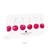 Bright pink cherry-shaped sticky notes on a white background, eco-friendly paper design, perfect for organization and note-taking, by The Wraperie.