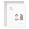 Salt and pepper shakers anniversary greeting card with minimalist watercolor design and handwritten text, ideal for celebrating special occasions with a touch of elegance.