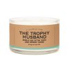 Relaxing husband-themed candle with witty scent notes, perfect for wedding gifts or home decor, creating a cozy ambiance and celebrating love and commitment.