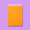 Bright orange notepad with lavender accents featuring inspirational quote at top, ideal for personalized notes, journaling, or note-taking at The Wraperie, the innovative food packaging and wrapping shop.