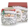Santa Claus-themed wrap mug with festive design, perfect for holiday gifting and cozy mornings. Unique holiday-inspired ceramic mug featuring Santa Claus imagery from The Wraperie.