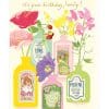 Vase filled with colorful flowers and perfume bottles, decorative birthday card with "it's your birthday, lovely!" message, cheerful and vibrant floral illustration.