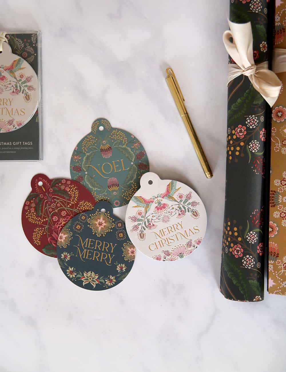 Merry Christmas gift tags with festive floral and bird designs, perfect for holiday wrapping and Christmas presents. Essential for holiday gift wrapping decor.