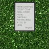 Bright green glitter background with a framed quote about Christmas by the Grinch, emphasizing holiday cheer and festive decorations.