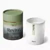 Aery Revive candle with a soothing aromatherapy scent featuring cedar, amber, bergamot, tonka, lime, and precious woods in a minimalist white and green design for relaxation.