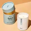 Lavender and eucalyptus scented soy candle from The Wraperie, designed for relaxing before sleep, in elegant packaging with minimalist branding.