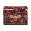 Colorful floral fabric clutch bag with a bee embellishment, perfect for accessories and stylish outings at The Wraperie.