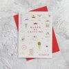 Colorful greeting card with coffee, tea, and beverage illustrations, featuring the phrase "Queen of Caffeine" for coffee lovers, set on a textured white surface with a red background.