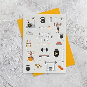 Bright birthday greeting card featuring fitness and gym workout icons, with the message "Let's Hit the Bar" and "Happy Birthday" on textured surface. Perfect for health-conscious celebrations.