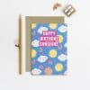 Bright birthday greeting card with sunshine, clouds, rainbows, and cheerful colors, perfect for celebrating sunny days and joyful occasions.
