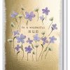 Soft purple and white flower illustrations on a gold textured background with the message "to a wonderful mum" - perfect Mother's Day or birthday card from The Wraperie.
