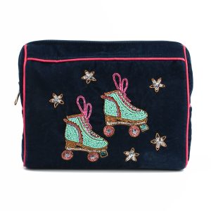 Colorful embroidered roller skate bag with star accents, perfect for travel, school, or casual outings, showcasing unique, artistic design by The Wraperie.