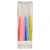 Multicolored birthday candles in a white box, ideal for celebrations and cake decor, from The Wraperie.