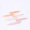 Bacon-shaped pastel-colored hair clips, cute custom hair accessories, wavy design, stylish and trendy hair styling tools, The Wraperie product display.