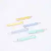 Yellow and blue wavy hair clips at The Wraperie, stylish hair accessories for women.