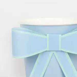Luxury pastel blue gift box with satin ribbon and bow for special occasions, elegant packaging for presents, attractive wrapping for celebrations and holidays, The Wraperie premium gift wrap service.