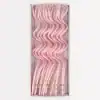 Pink wavy birthday candles in a gift box, perfect for celebration cake decoration, from The Wraperie. Elegant and fun party supplies for birthdays and special occasions.