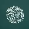 White floral wreath design on green background for eco-friendly wrap packaging.