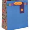 Vibrant blue gift bag featuring colorful geometric and star patterns, with orange handle and star tag, perfect for festive occasions.