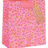 Decorative pink gift bag with multicolored hearts, perfect for romantic occasions or gift-giving. Features a pink ribbon handle and a matching gift tag, ideal for presenting thoughtful gifts.