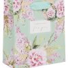 Luxurious floral gift bag with pastel pink and green flowers, perfect for special occasions and gift wrapping, featuring a built-in tissue holder for added convenience.