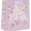 Vibrant pastel gift bag with floral design and "Just for You" message, perfect for special occasions and celebrations.
