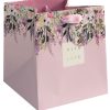 Pink floral gift bag with "With Love" message, ribbon handle, perfect for birthday or wedding gifts, featuring elegant botanical design from The Wraperie.