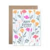 Bright floral birthday card with colorful poppies and the message "Happy Birthday" for celebrating special occasions. Perfect for sending warm wishes to loved ones.