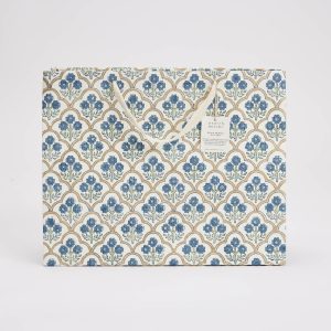 Vibrant blue floral-patterned wrap paper gift bag with elegant handle, perfect for stylish gift wrapping and eco-friendly packaging, showcasing high-quality artisanal designs.