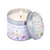 Soft soy wax candle with floral design, labeled “Ylang Ylang & Patchouli,” crafted by Belly Button Designs, perfect for creating a calming and aromatic atmosphere.