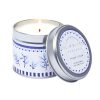 Soft linen scented soy wax candle in a decorative tin with floral design, perfect for home decor and relaxation.