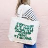 Personalized tote bag with uplifting quote, perfect for casual outings, shopping, or daily use, featuring eco-friendly design and stylish text printed in bold green letters.