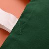 Bright green textured fabric with visible stitching, part of a custom-wrapped product from The Wraperie, showcasing high-quality materials and professional craftsmanship in eco-friendly packaging.