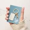 Inspiring teacher appreciation keychain with motivational message, gold charm, and gift card from The Wraperie for special educators.