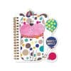 Colorful dog-themed notebook with playful polka dot design, featuring balloons and whimsical Woofly Notes label, perfect for kids' stationery or note-taking.