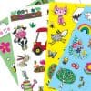 Colorful farm animal and gardening-themed sticker sheets featuring a cow, bunny, and garden tools for kids' crafts and decorating projects.
