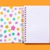 Colorful floral notebook with spiral binding, ideal for creative journaling and note-taking at The Wraperie.