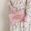 Pink clutch bag with 