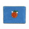 Beaded orange fruit clutch bag with floral embellishments on blue fabric, perfect for summer accessories, casual outings, and stylish events.